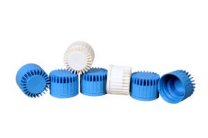 Blue and white plastic bottle caps